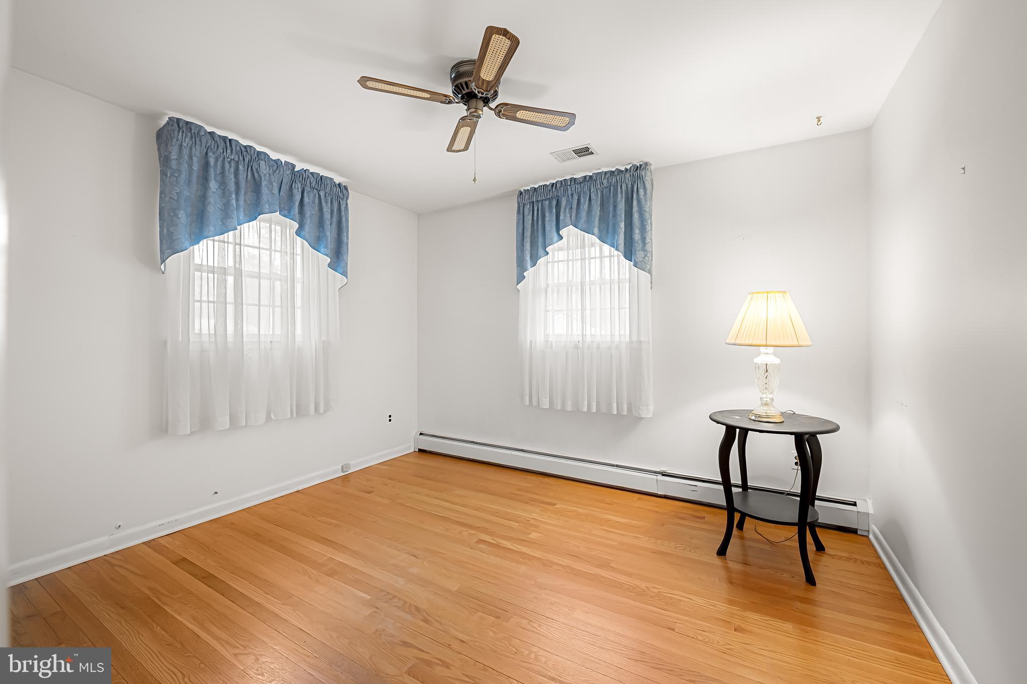 2114 Oaklyn Drive Fallston, MD 21047 - Photo 25 of 41 a view of empty room with wooden floor and fan