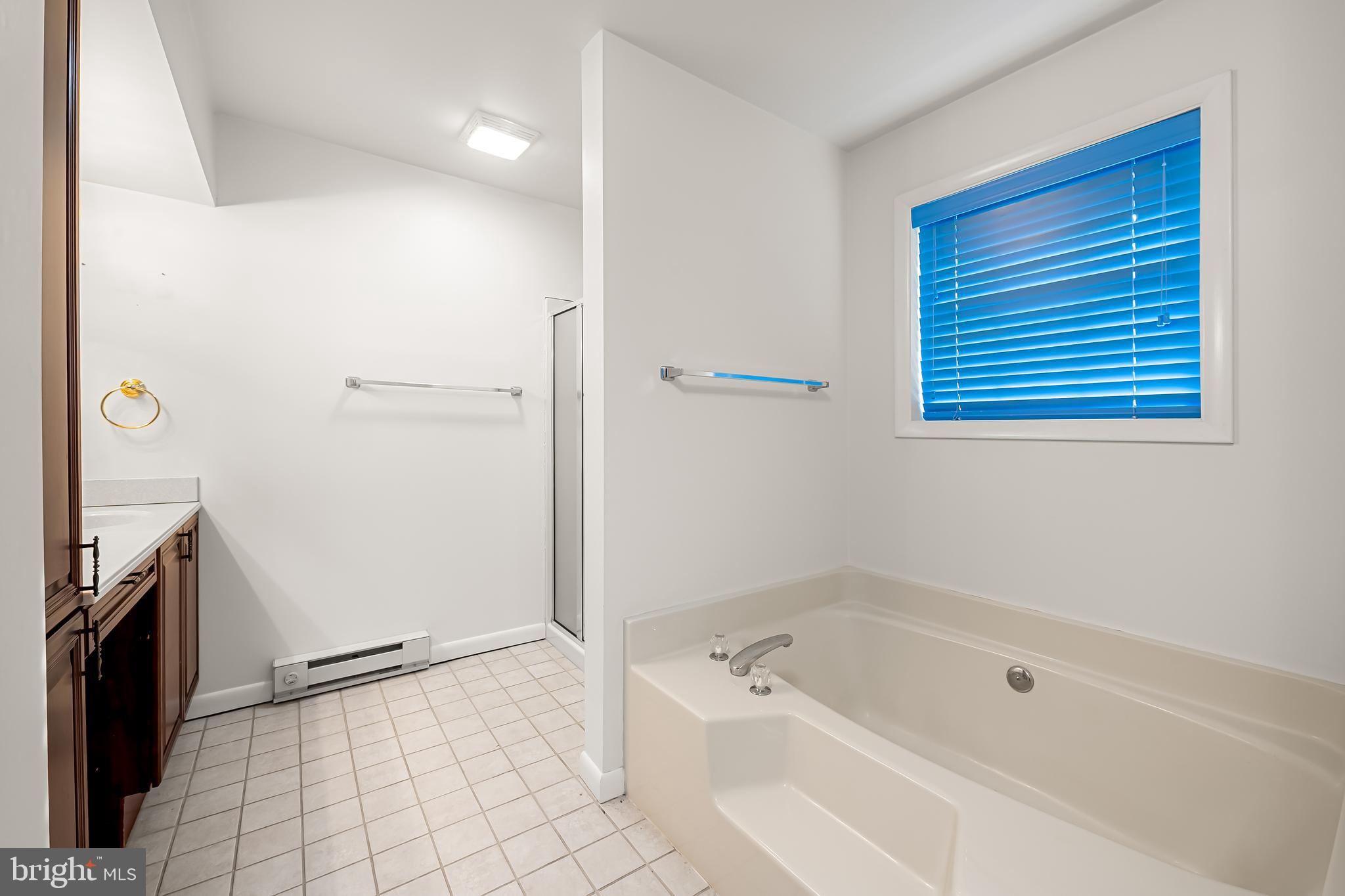 2114 Oaklyn Drive Fallston, MD 21047 - Photo 27 of 41 a bathroom with a bathtub and a shower