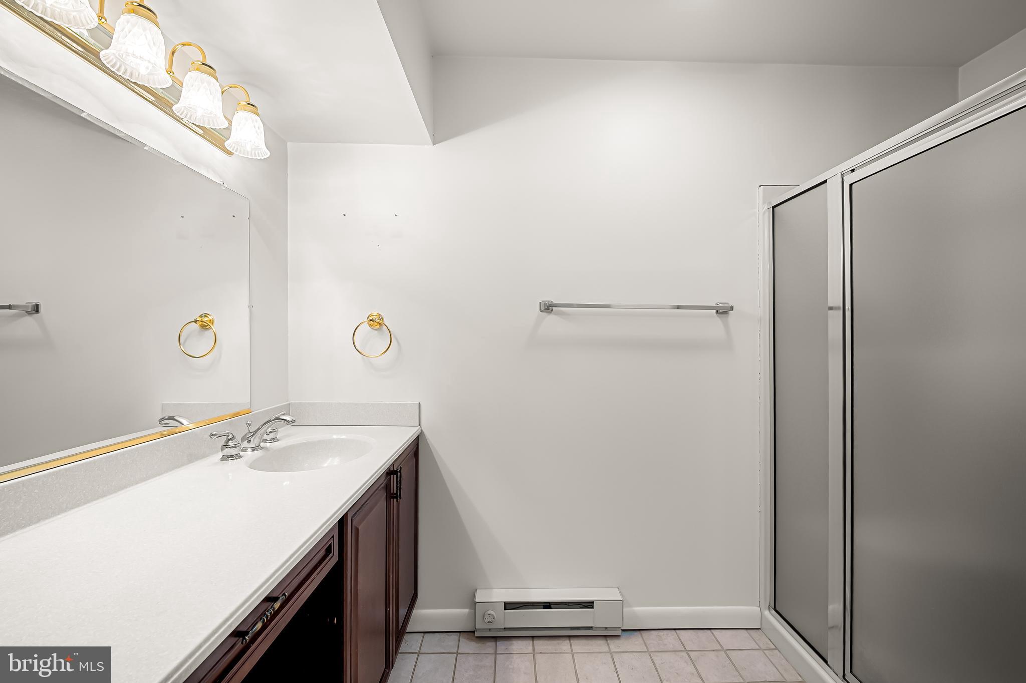 2114 Oaklyn Drive Fallston, MD 21047 - Photo 28 of 41 a bathroom with a sink and a mirror