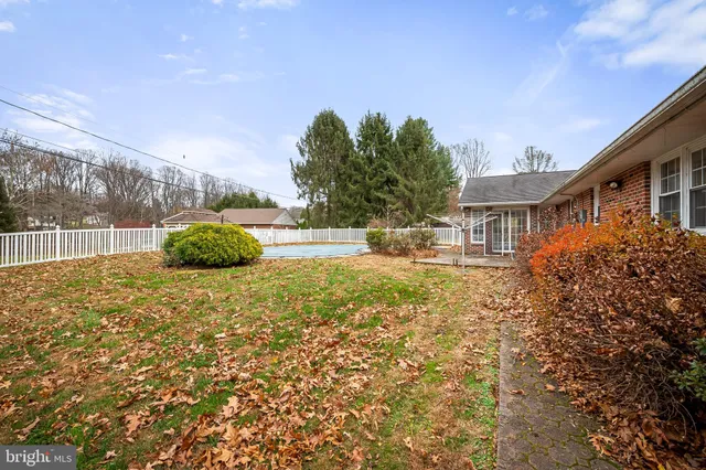 a picture of a room with a bench