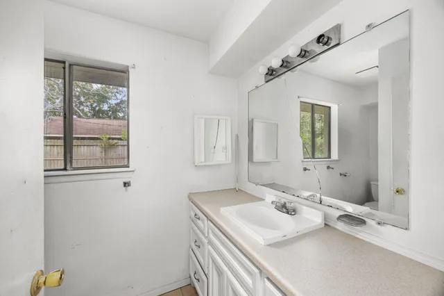 a view of a kitchen with a sink