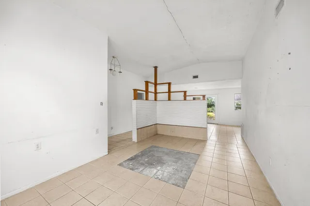 a view of a livingroom with wooden floor