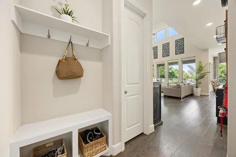 a view of a livingroom with furniture and a window