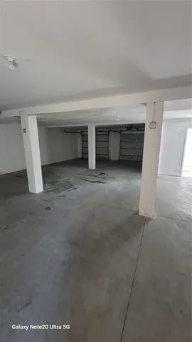 a view of empty room with garage