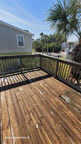 a view of wooden balcony with outdoor space