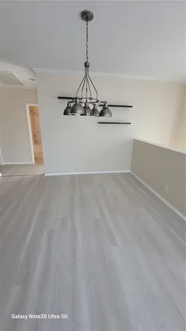 a view of a room with an empty space