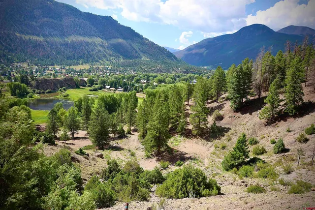a view of a houses with a yard
