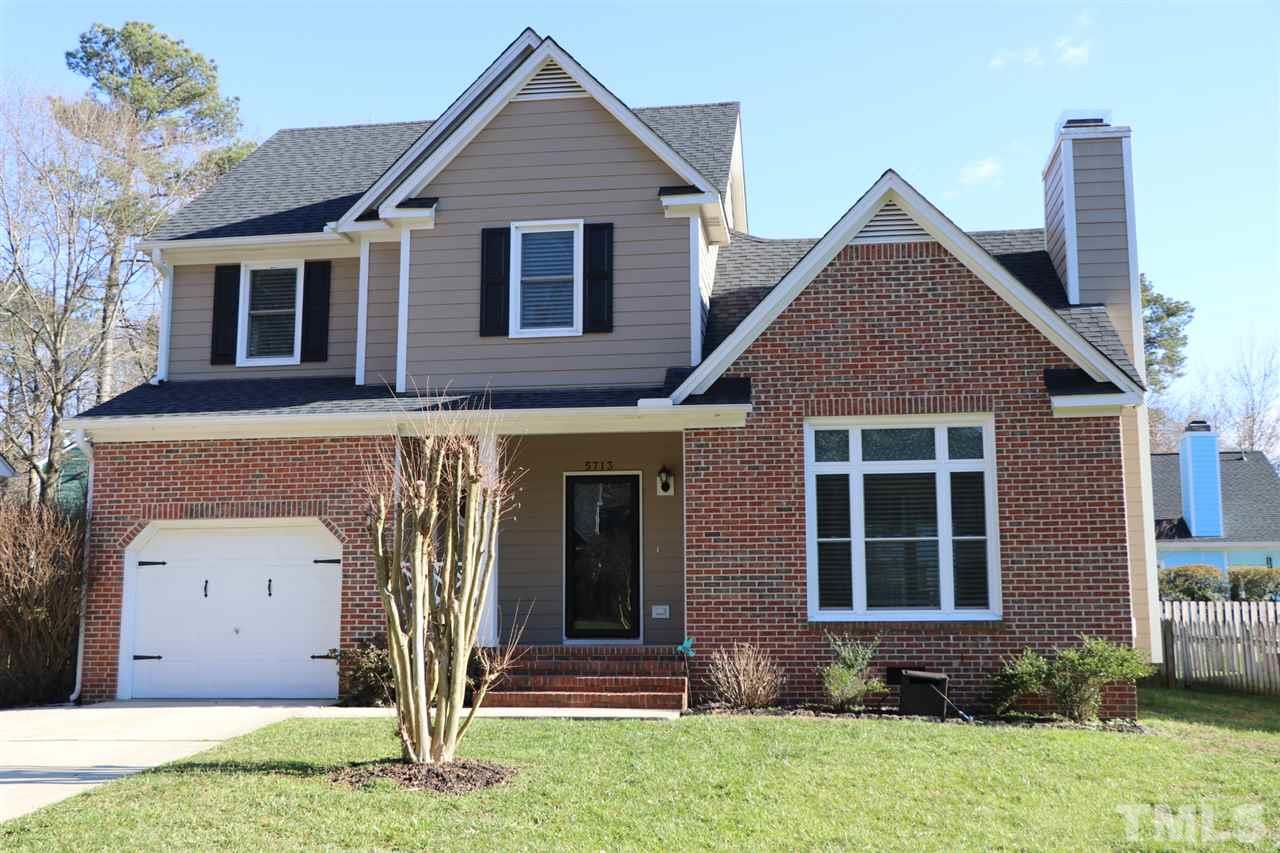 5713 Edgebury Road Raleigh, NC 27613 - Photo 1 of 26 a front view of a house with a yard