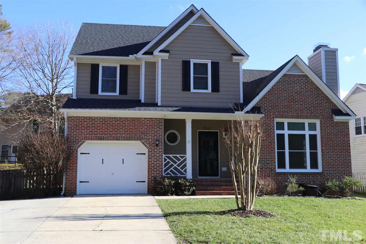 5713 Edgebury Road Raleigh, NC 27613 - Photo 2 of 26 a front view of a house with a yard
