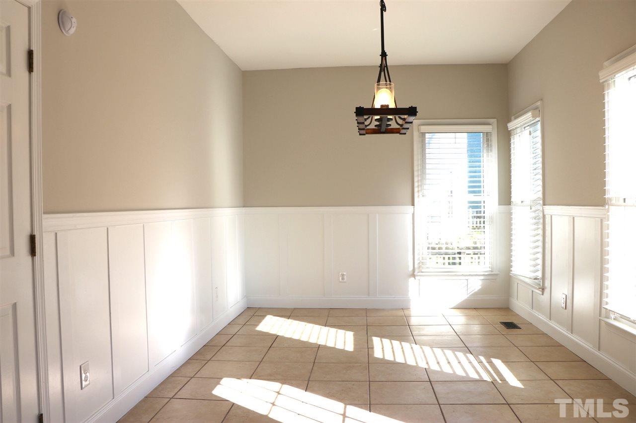 5713 Edgebury Road Raleigh, NC 27613 - Photo 12 of 26 a view of an empty room with a window