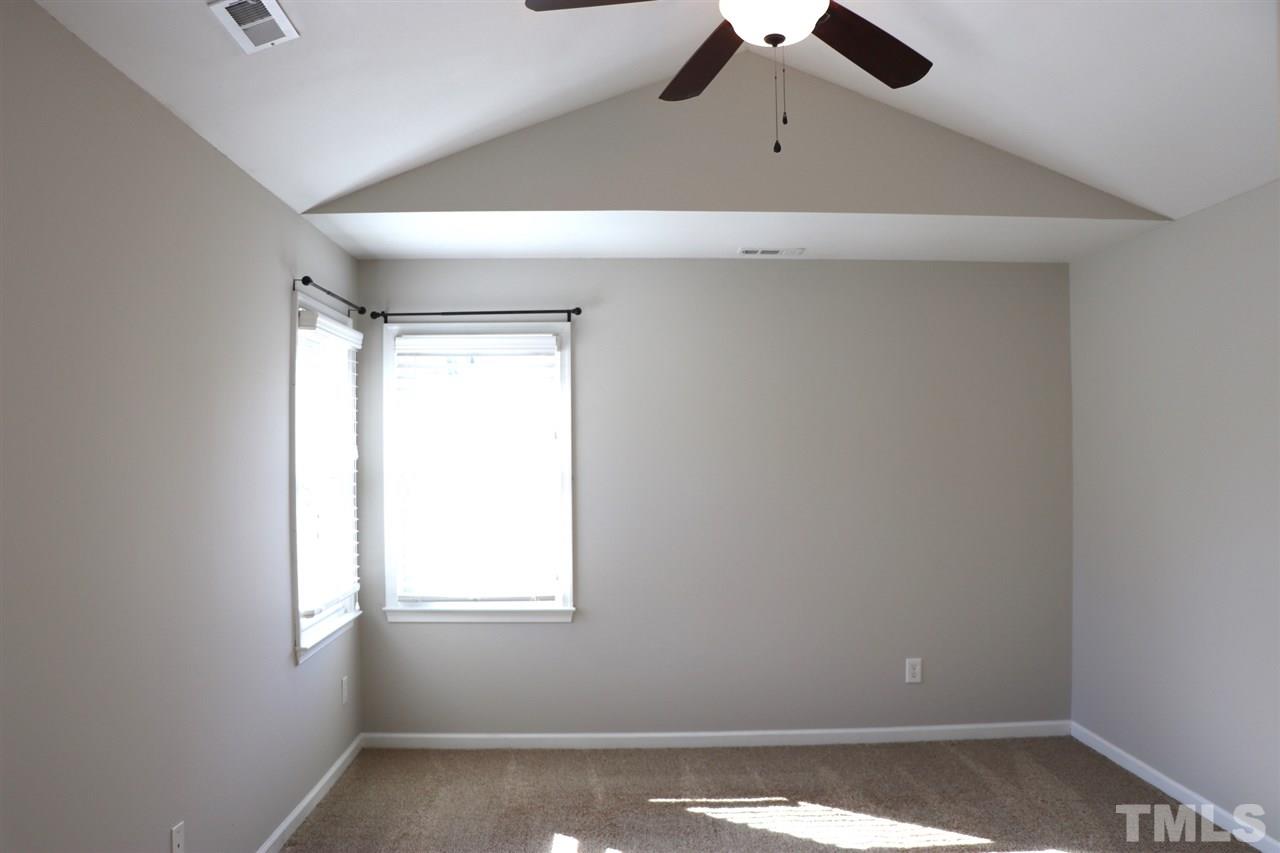 5713 Edgebury Road Raleigh, NC 27613 - Photo 14 of 26 an empty room with a window