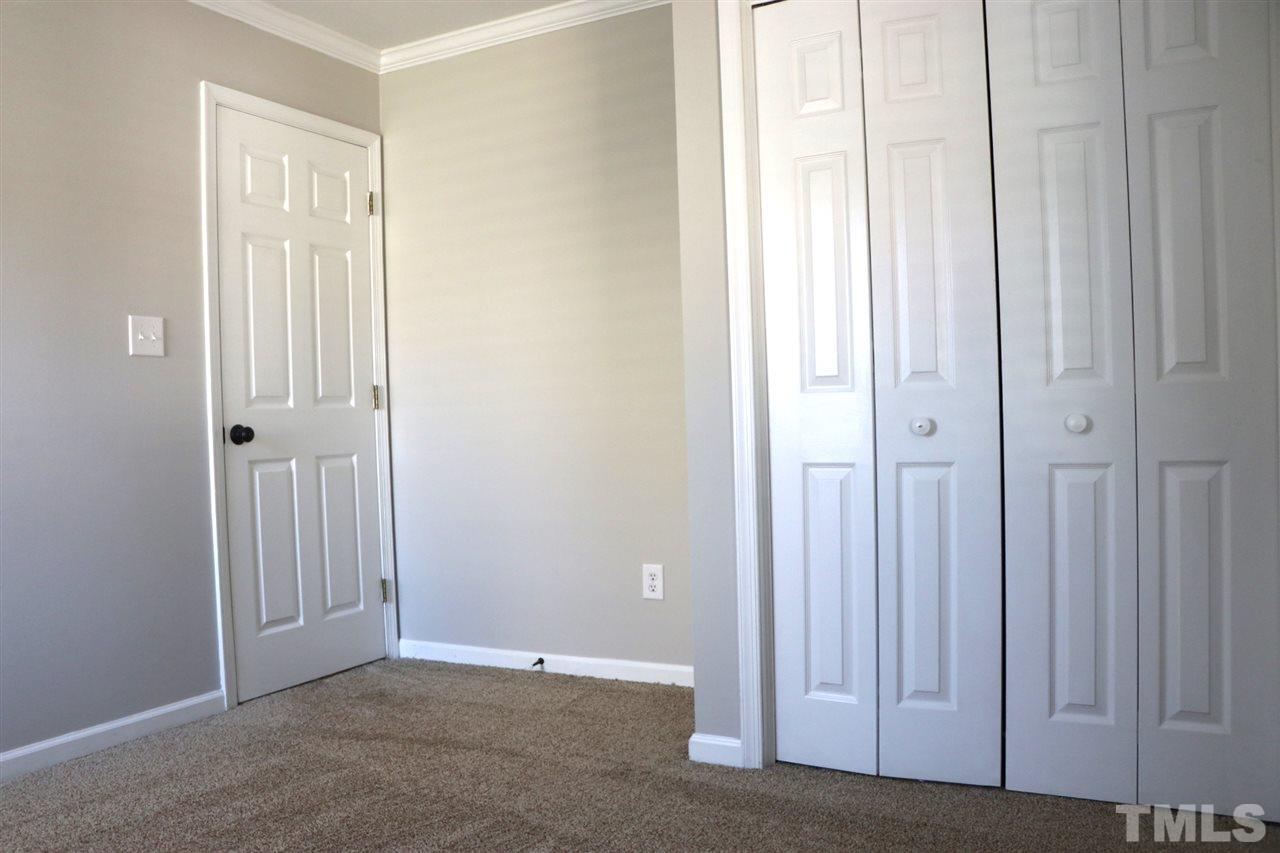 5713 Edgebury Road Raleigh, NC 27613 - Photo 19 of 26 an empty room with windows