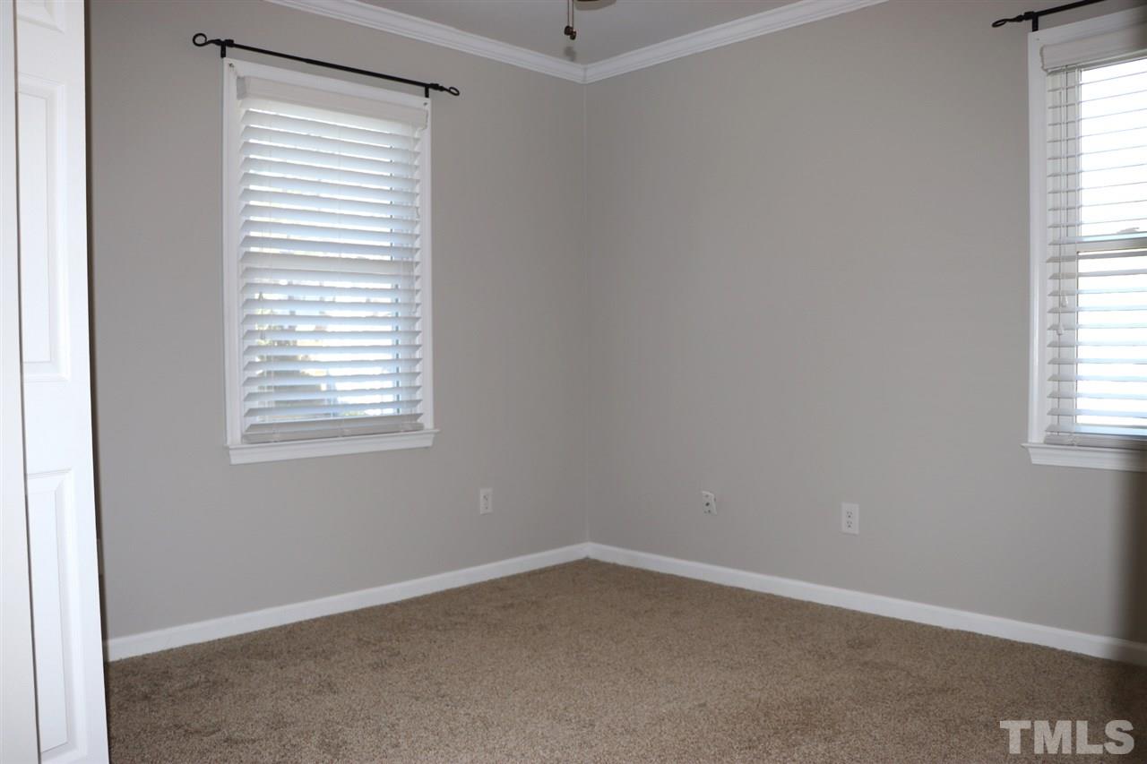 5713 Edgebury Road Raleigh, NC 27613 - Photo 20 of 26 an empty room with a window