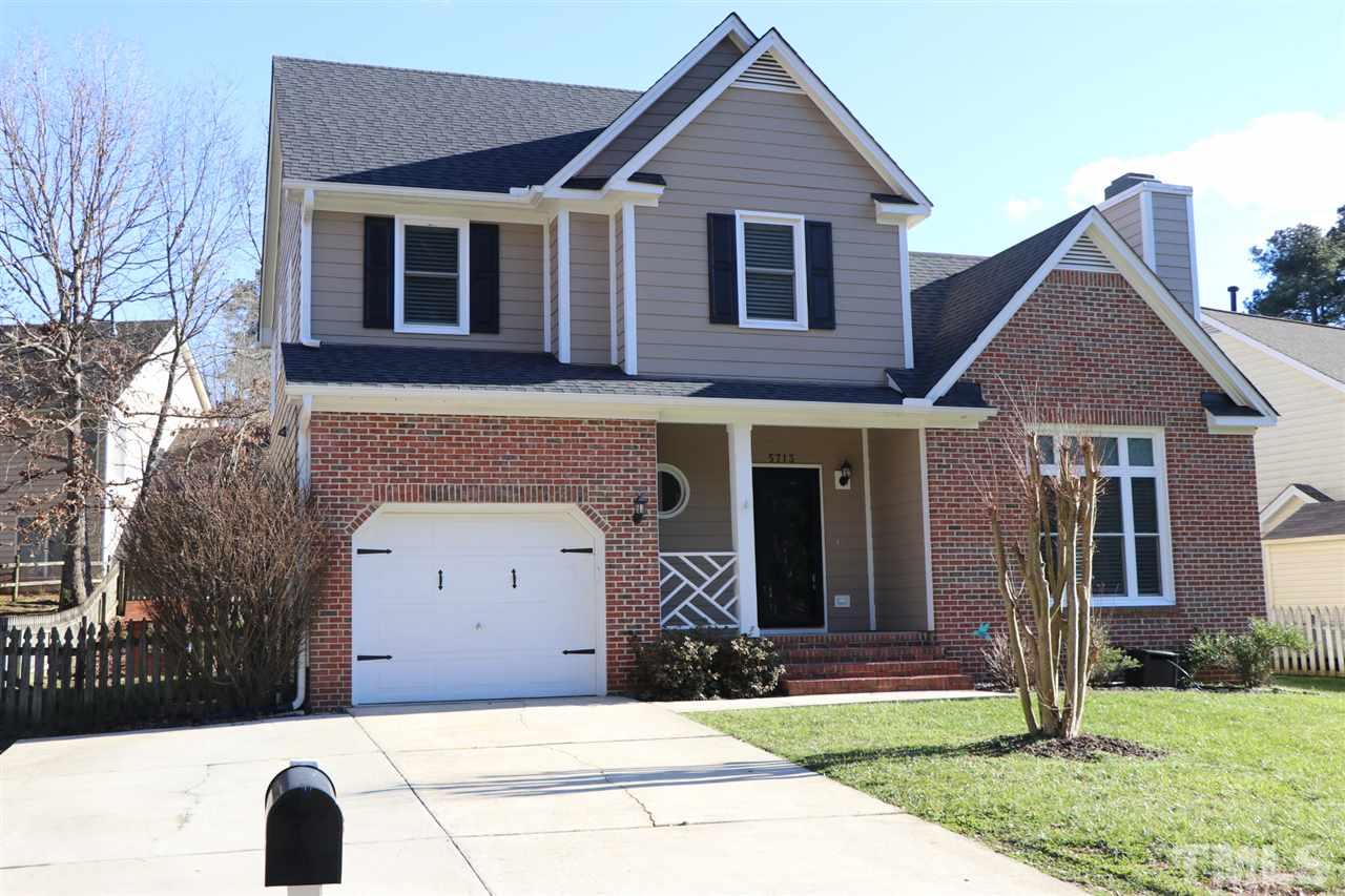 5713 Edgebury Road Raleigh, NC 27613 - Photo 26 of 26 a front view of a house with a yard