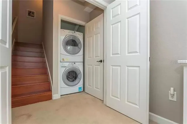 a view of entryway with wooden floor and a window