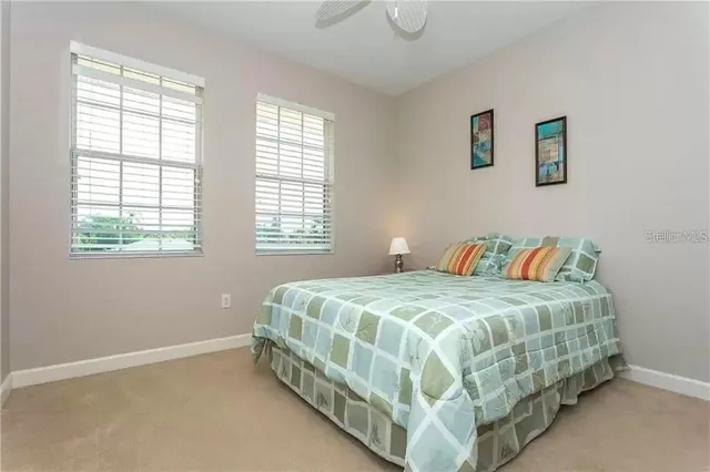 a bathroom with a double vanity sink and mirror