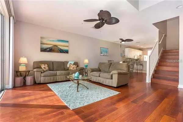 a living room with furniture and a rug