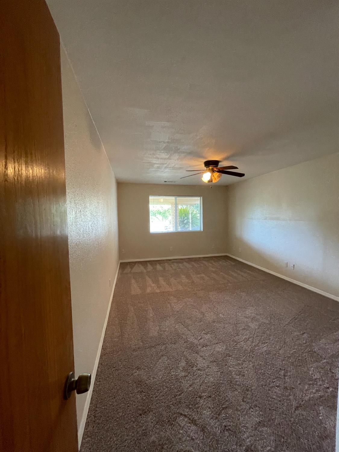 2344 Tivy Valley Road Sanger, CA 93657 - Photo 22 of 61 a view of empty room with window