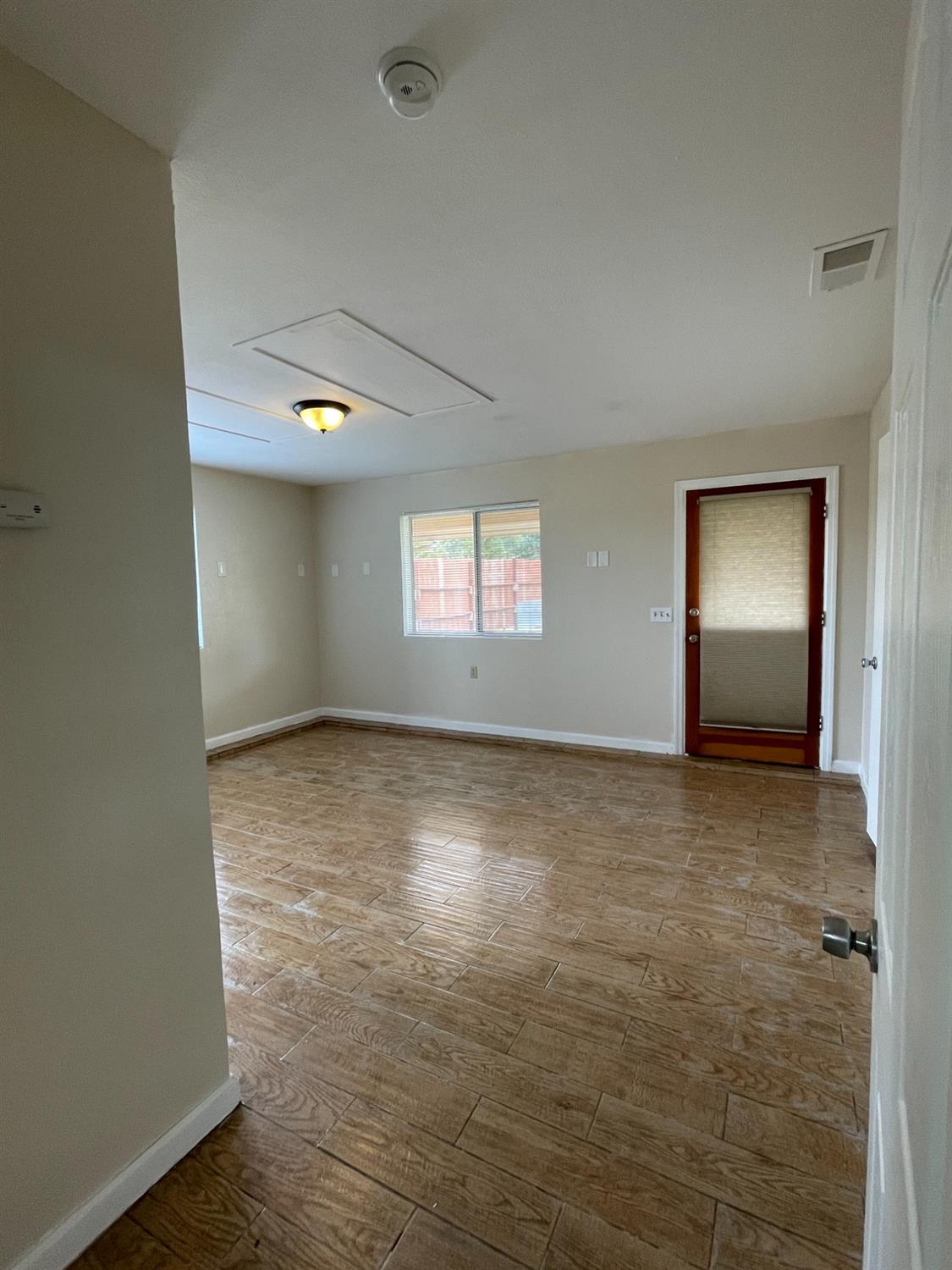 2344 Tivy Valley Road Sanger, CA 93657 - Photo 28 of 61 an empty room with a window