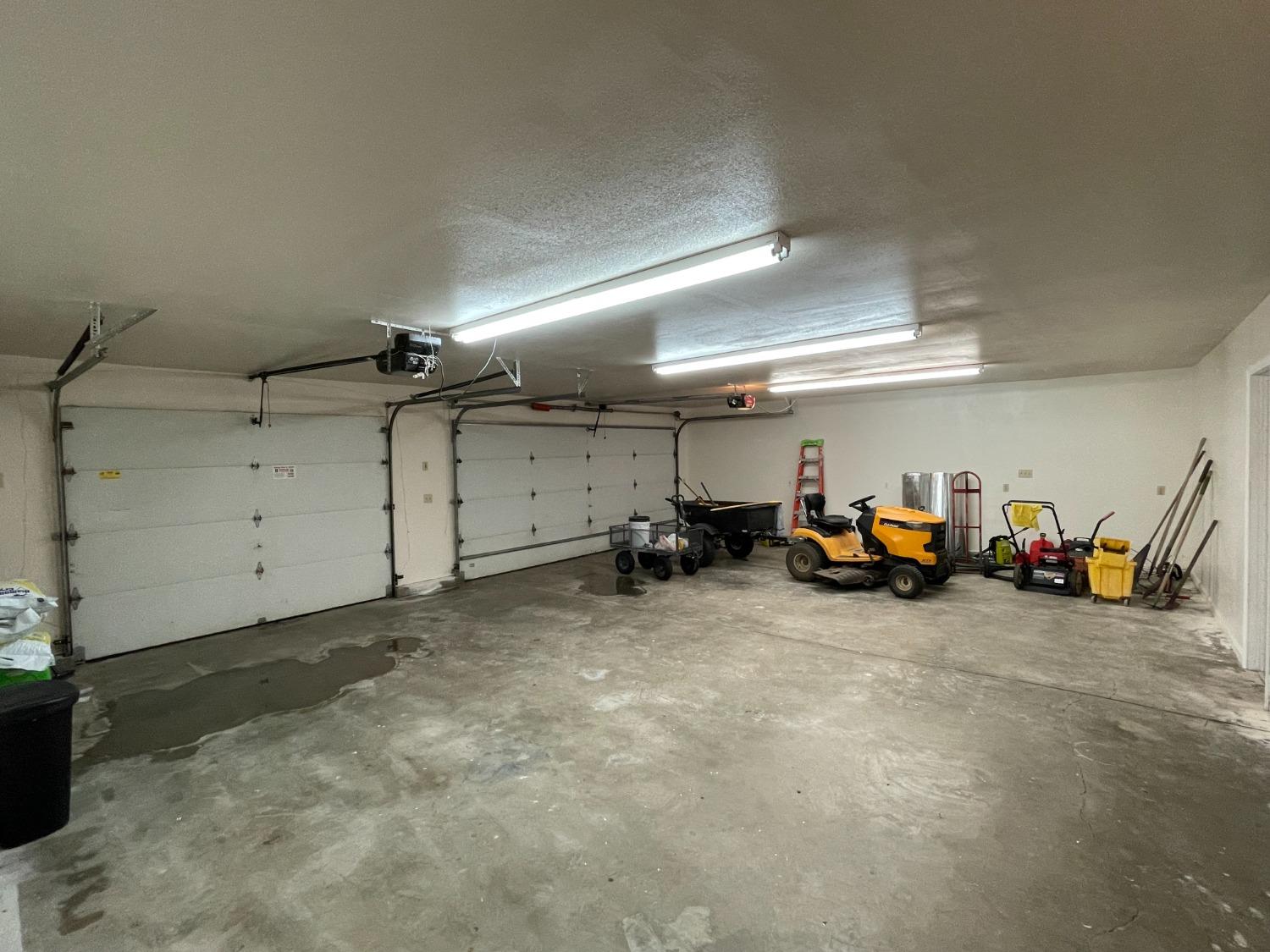 2344 Tivy Valley Road Sanger, CA 93657 - Photo 34 of 61 a view of a garage with a lot of stuff