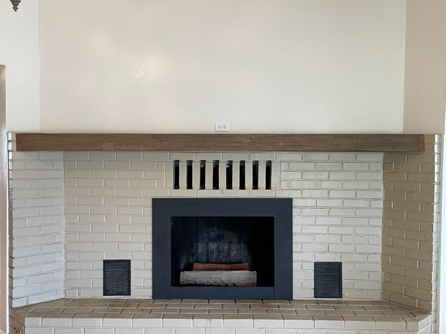 2344 Tivy Valley Road Sanger, CA 93657 - Photo 5 of 61 a living room with a fireplace