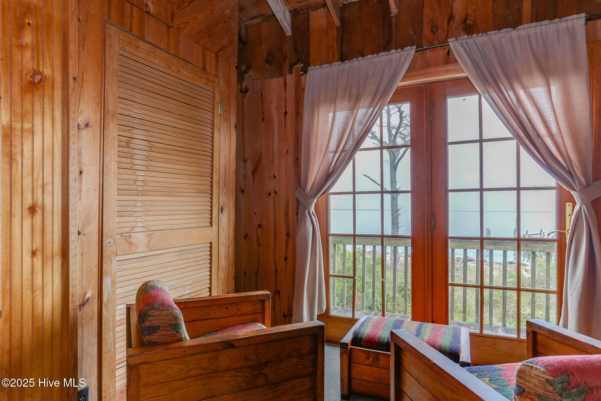 342 Cahoon Road Manns Harbor, NC 27953 - Photo 17 of 42 Bedroom with water view