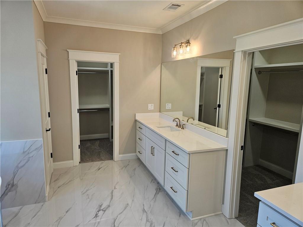 614 Old Tucker Road Stone Mountain, GA 30087 - Photo 21 of 29 a kitchen with a sink and a refrigerator