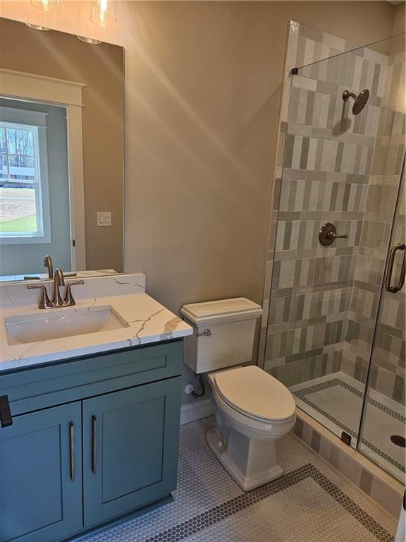 614 Old Tucker Road Stone Mountain, GA 30087 - Photo 25 of 29 a bathroom with a sink toilet and shower