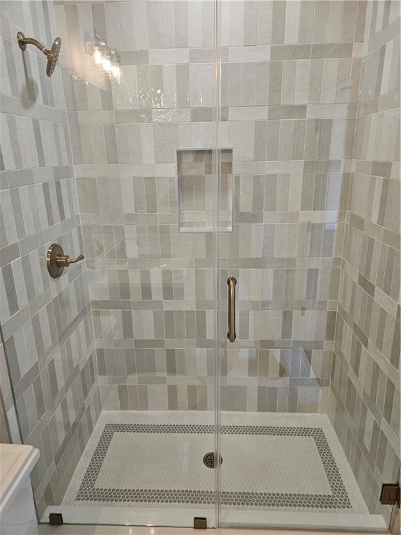 614 Old Tucker Road Stone Mountain, GA 30087 - Photo 26 of 29 a bathroom with a shower