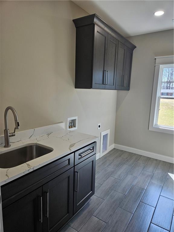 614 Old Tucker Road Stone Mountain, GA 30087 - Photo 27 of 29 a kitchen with a sink and cabinets