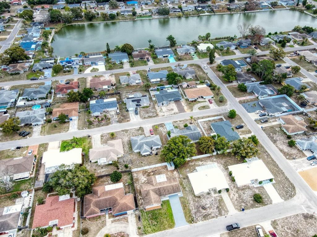 10320 Honeysuckle Lane Port Richey, FL 34668 - Photo 50 of 53 a picture of a lake with lots of residential buildings lake and ocean view