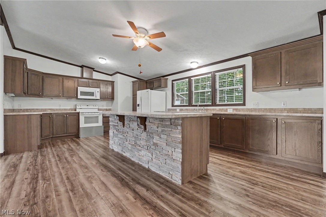 3424 Painesville Warren State Road Southington, OH 44470 - Photo 25 of 50 3424 Painesville Warren Rd, Southington, OH 44470 – Enjoy comfortable one-floor living in this well-maintained home built in 2018. Featuring 3 bedrooms, 2 full bathrooms, and an open-concept layout, this home offers both functionality and convenience. The spacious kitchen, dining, and living areas provide plenty of room for everyday living and entertaining. A large garage offers ample space for vehicles, storage, hobbies, or workshop needs. Situated on a generous lot with a welcoming front porch, this property combines modern living with a peaceful country setting. Move-in ready and waiting for its next owner!