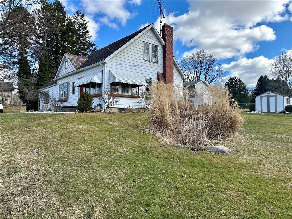 3956 New Castle Road Pulaski, PA 16143 - Photo 2 of 37 a view of a house with a yard