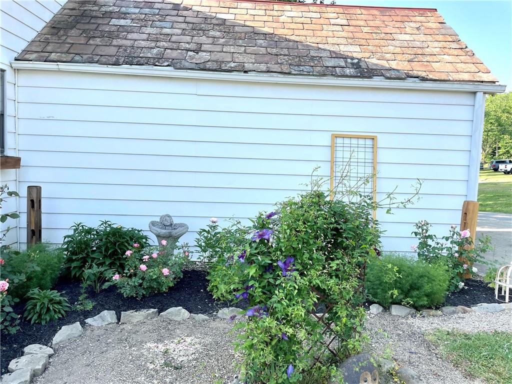 3956 New Castle Road Pulaski, PA 16143 - Photo 23 of 37 a view of a pathway besides a house