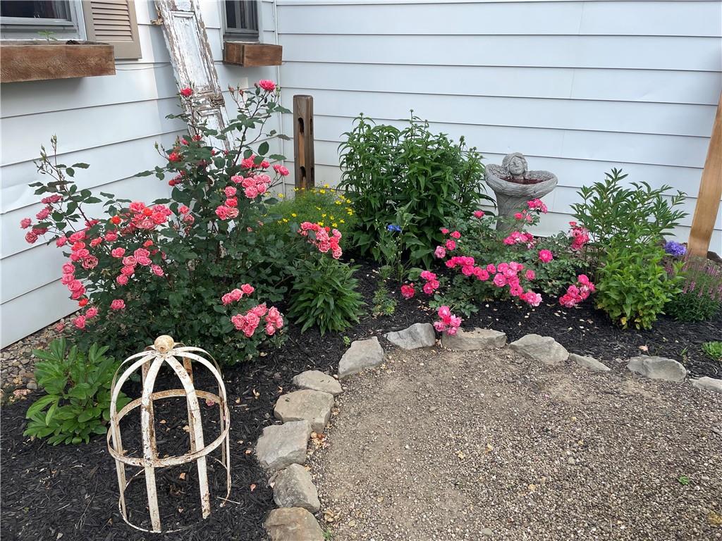 3956 New Castle Road Pulaski, PA 16143 - Photo 26 of 37 a view of yard with flowers and flowers