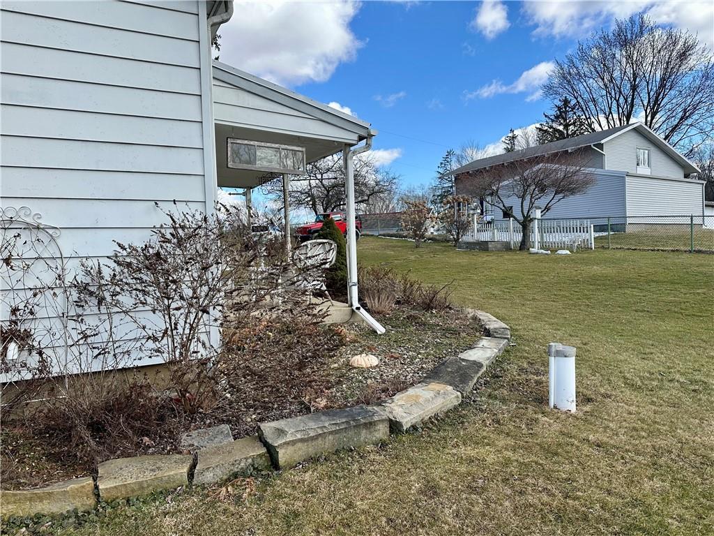 3956 New Castle Road Pulaski, PA 16143 - Photo 28 of 37 a view of a house with a yard