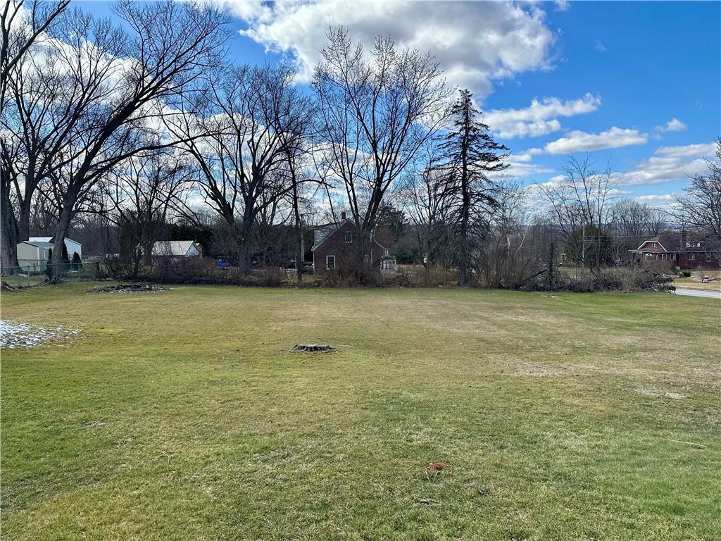 3956 New Castle Road Pulaski, PA 16143 - Photo 30 of 37 a view of a yard with a house in the background