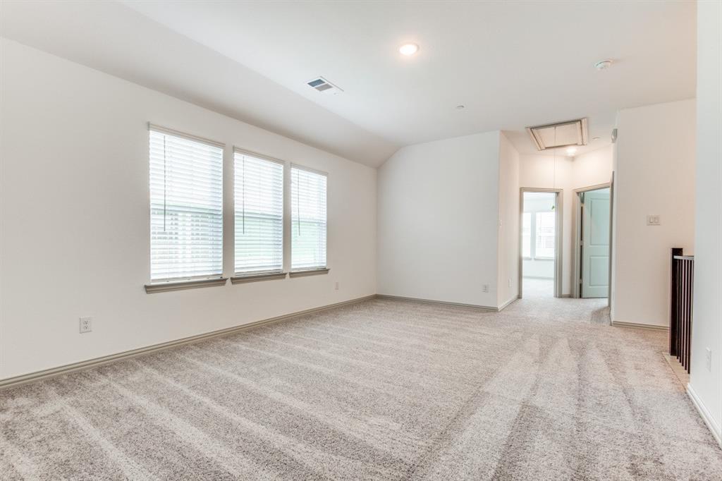 8913 Swallowtail Street Frisco, TX 75035 - Photo 22 of 38 a view of an empty room with a window