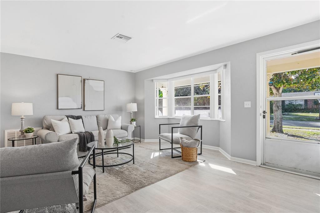 2481 12th Avenue Southwest Largo, FL 33770 - Photo 2 of 21 a living room with furniture and a window
