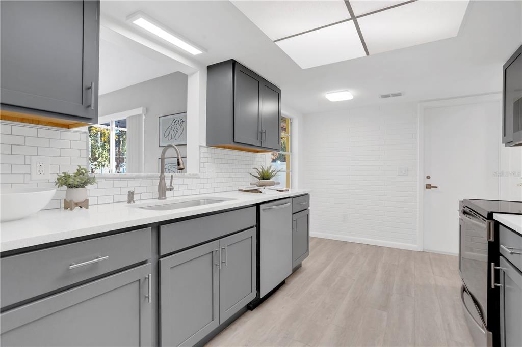 2481 12th Avenue Southwest Largo, FL 33770 - Photo 6 of 21 a bathroom with a sink and a mirror