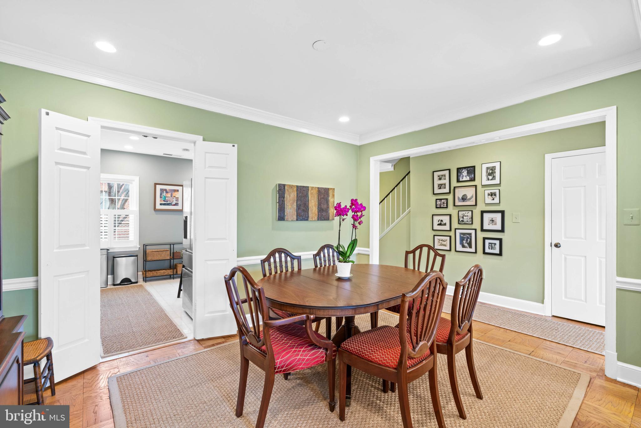 3297 Sutton Place Northwest, Unit B Washington, DC 20016 - Photo 15 of 43 a view of a dining room with furniture and wooden floor