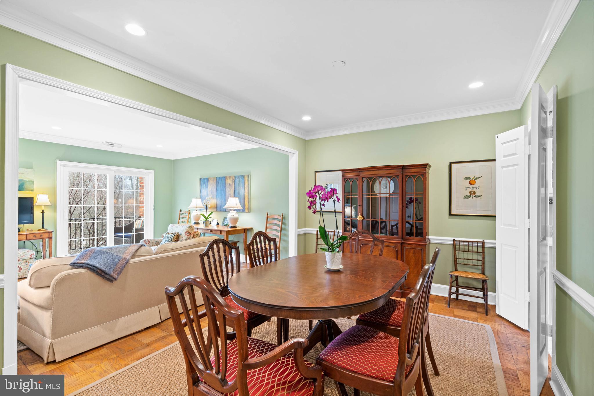 3297 Sutton Place Northwest, Unit B Washington, DC 20016 - Photo 16 of 43 a view of a dining room with furniture and wooden floor