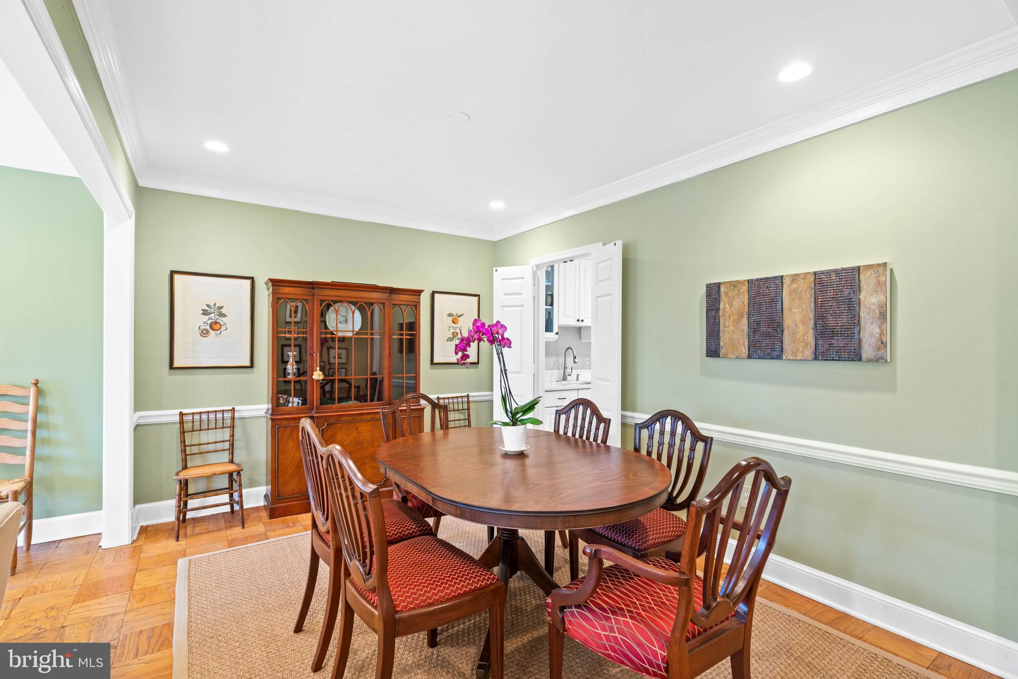 3297 Sutton Place Northwest, Unit B Washington, DC 20016 - Photo 18 of 43 a dining room with furniture and wooden floor