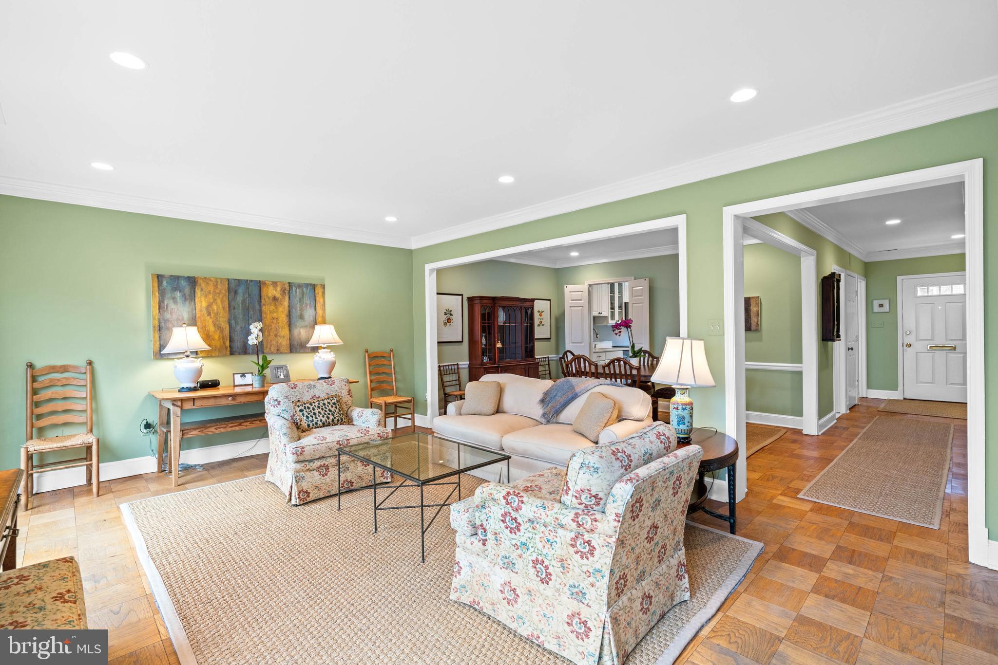 3297 Sutton Place Northwest, Unit B Washington, DC 20016 - Photo 20 of 43 a living room with furniture and a table