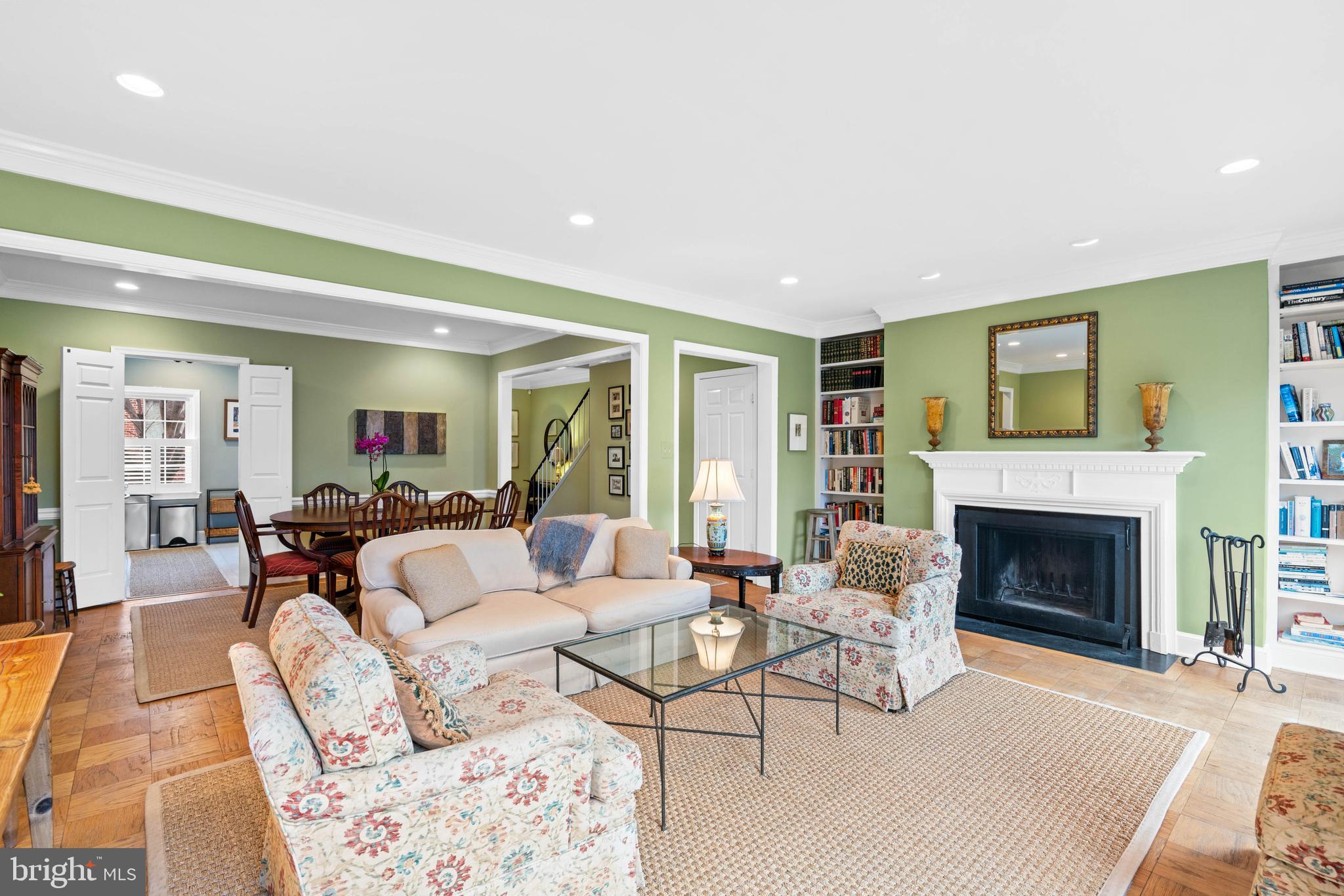 3297 Sutton Place Northwest, Unit B Washington, DC 20016 - Photo 23 of 43 a living room with furniture and a fireplace