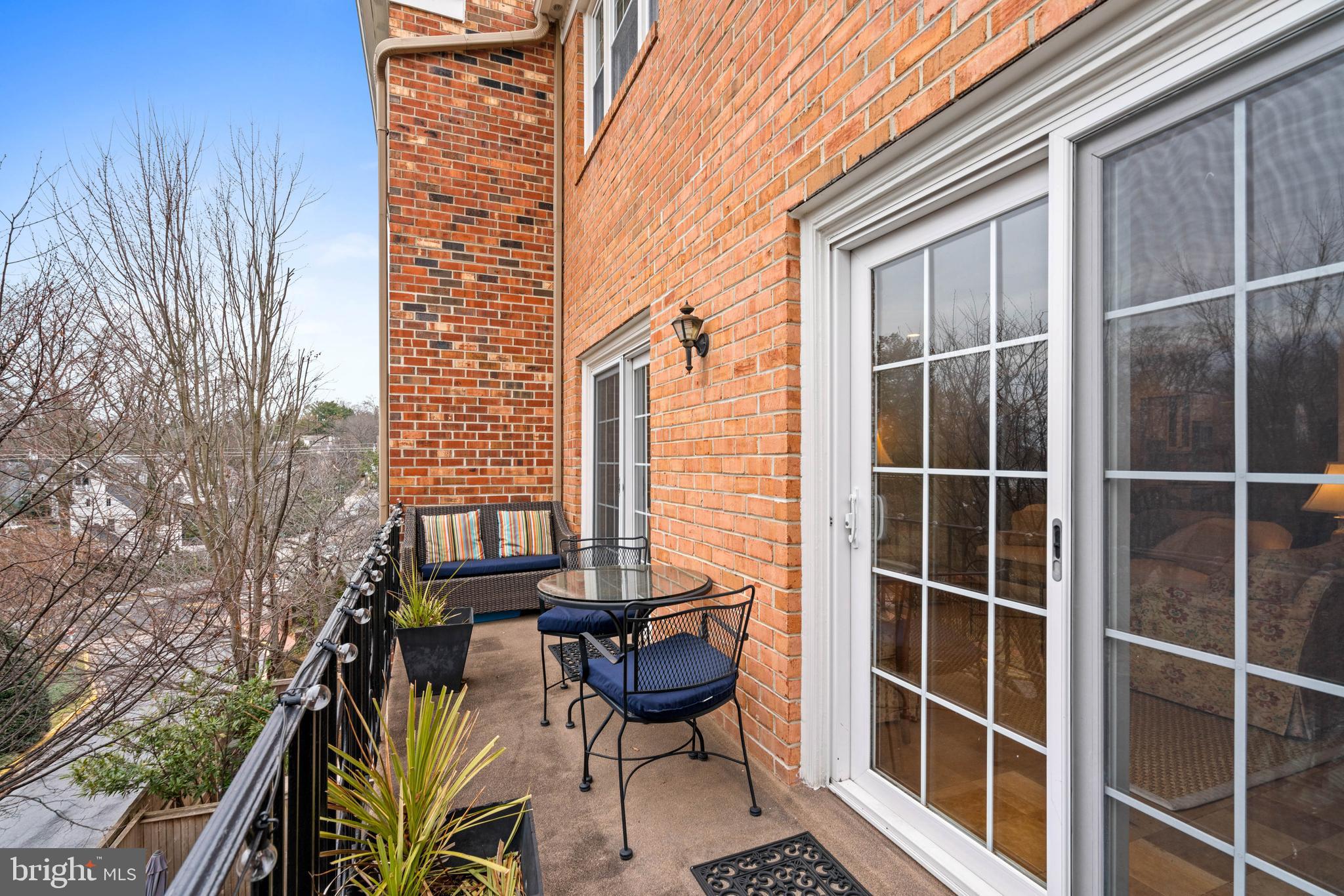 3297 Sutton Place Northwest, Unit B Washington, DC 20016 - Photo 24 of 43 a view of balcony with couch