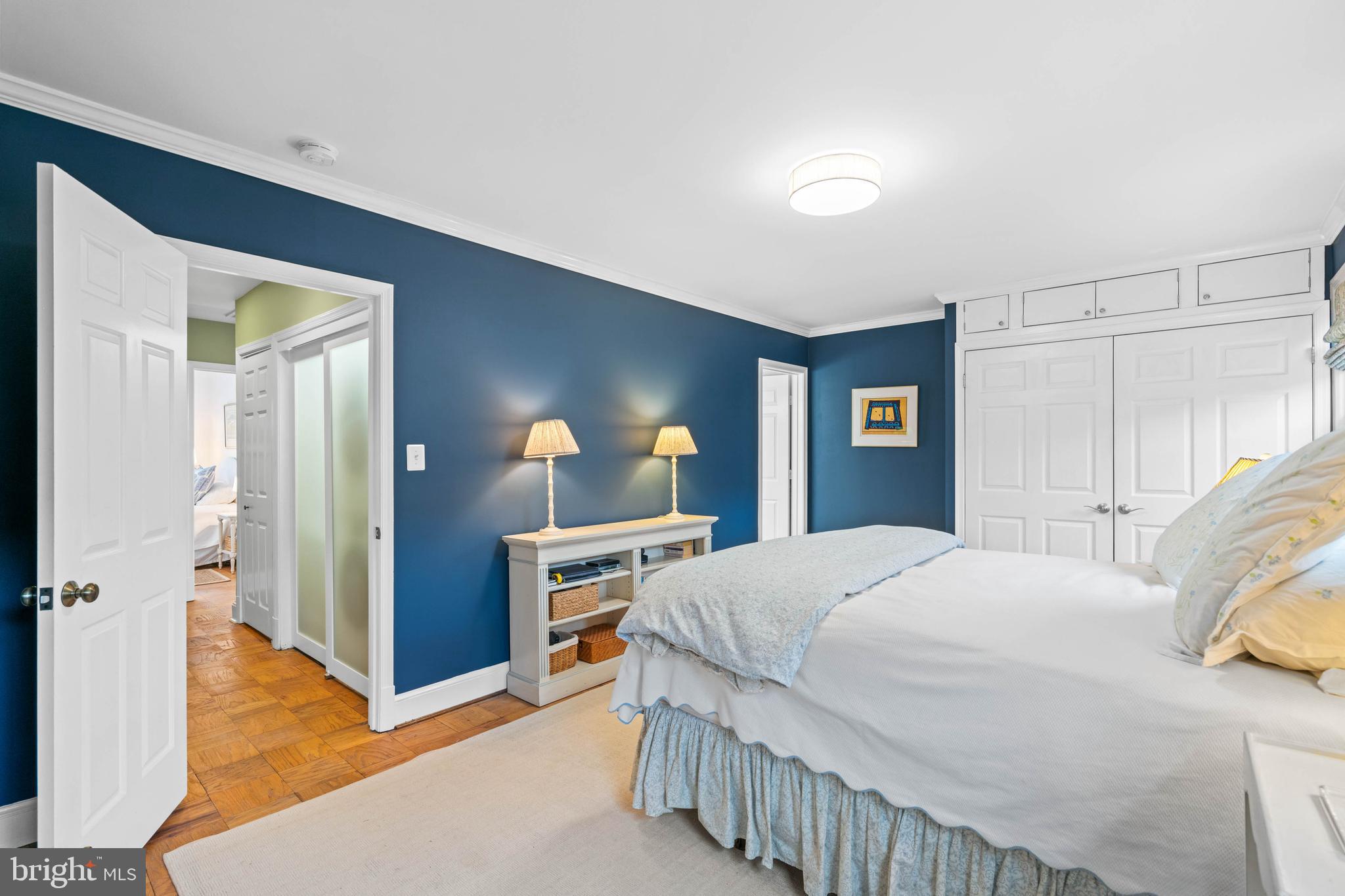 3297 Sutton Place Northwest, Unit B Washington, DC 20016 - Photo 38 of 43 a bedroom with a bed and a dresser