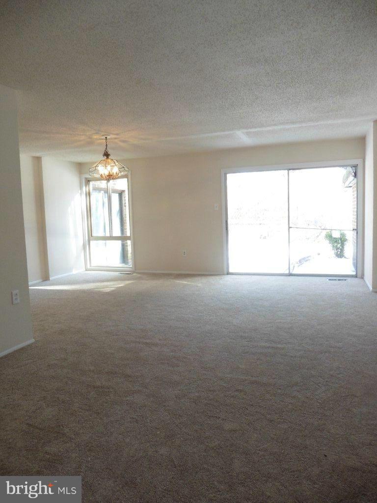 9429 Kilimanjaro Road Columbia, MD 21045 - Photo 8 of 13 an empty room with a window