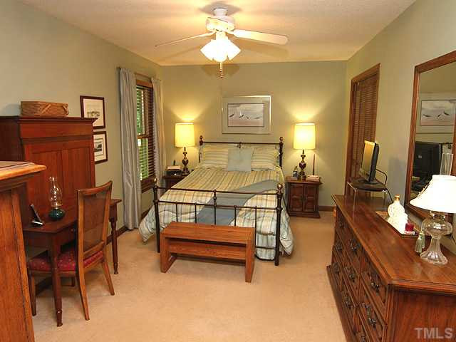 8829 Woodyhill Road Raleigh, NC 27613 - Photo 9 of 21 If you have young children, this master is convenient to two additional bedrooms on this same level. Master Bedroom