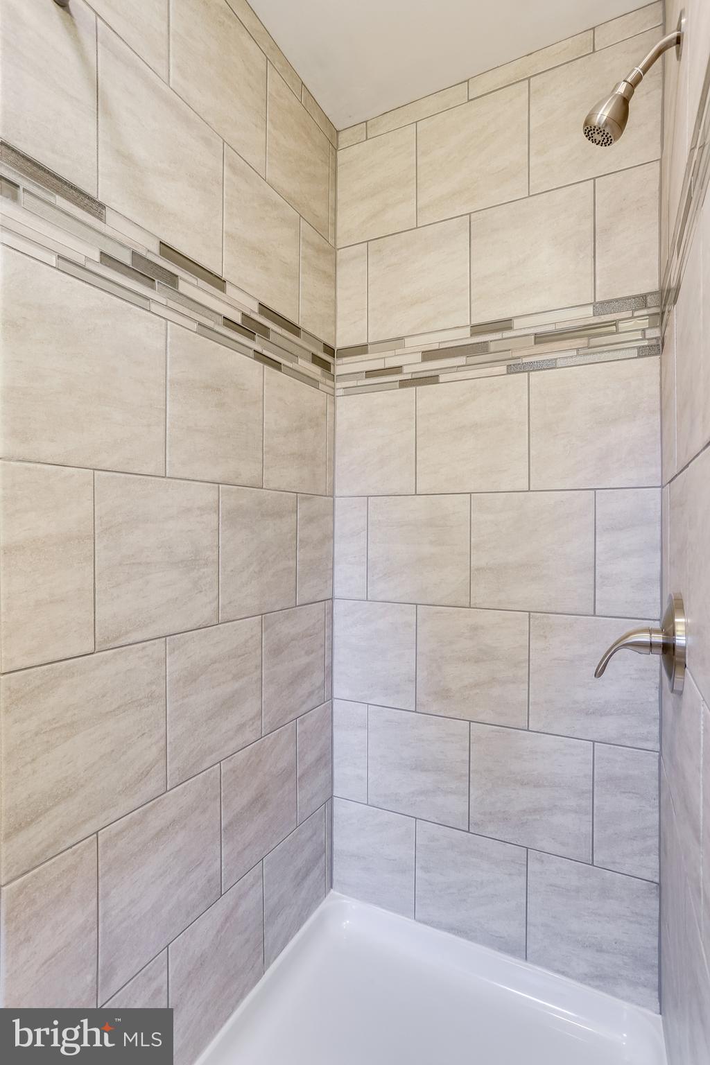 221 Coldbrook Road Lutherville-Timonium, MD 21093 - Photo 15 of 37 Beautiful Schleuter Master Bath Shower w/ Listello